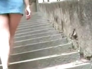Wide Ass Girl Towing Her Load Up The Stairs In This Voyeur Video