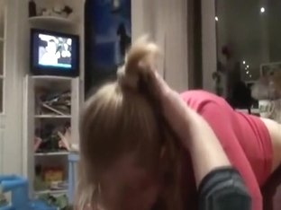 Ponytailed Girl Sucks Cock And Swallows On The Sofa, While Her Man Watches Tv.