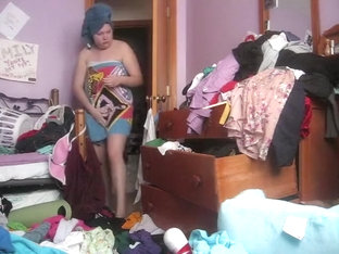 Chubby Woman Changes In A Messy Room