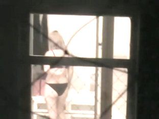Girl Strips And Touches Nude Tits On Window Voyeur Movie