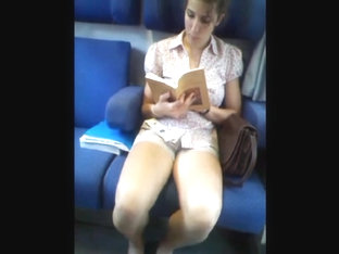 Girl Very Nice In Shorts Reading In Train