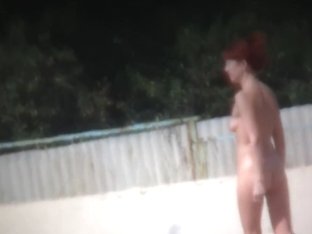Breathtaking Redhead Swimming Naked On A Nudist Beach