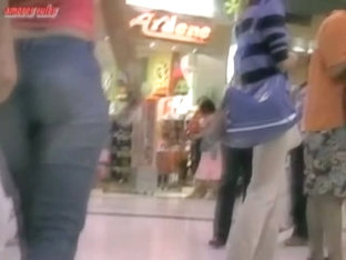Sexy Girl Walking Around A Mall With A Voyeur Cam Following