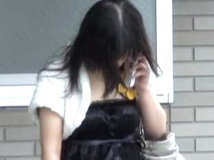 Cute Asian Teen On Her Phone Got A Good Boob Sharking.