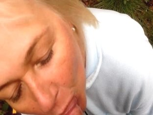 Mature Blond Woman Has Oral Sex Outside
