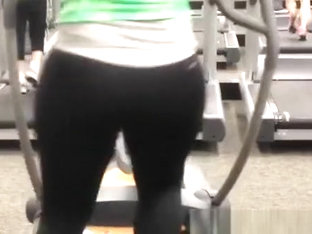 Woman In Tight Sports Pants Exercising