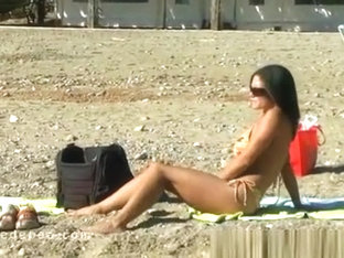 Girl Peeing On The Beach