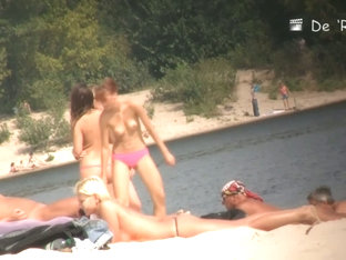 Naked Hotties Followed Around By A Nude Beach Voyeur