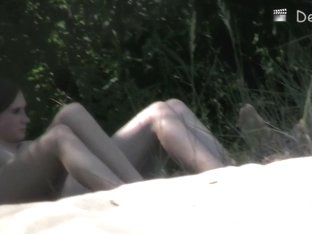An Attractive Couple Gets Voyeur Cammed On The Nude Beach