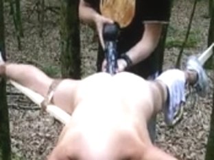 Bound To A Cross And Screwed With A Large Vibrator In The Forest