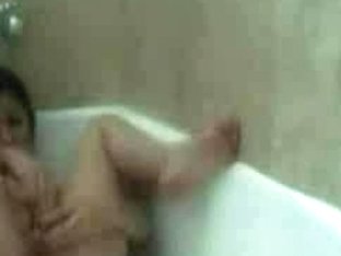 Magic Dildo Helps A Nude Brunette In The Shower To Reach Orgasm