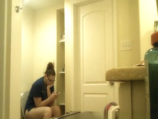 Chubby Nerd Girl In Toilet