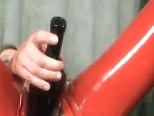Beauty In Red Latex Is Fisting Her Twat With Sex Toy