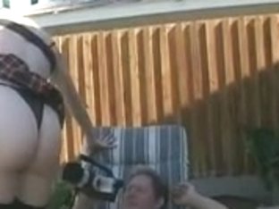 Blond Tramp Takes Pecker In Backyard With Pants On In Miniskirt