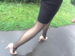 Following Candid Woman In Black Pantyhose And High Heels
