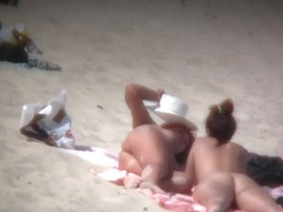 Nude Sun Tanning Girls Expose Themselves To A Beach Spy Cam